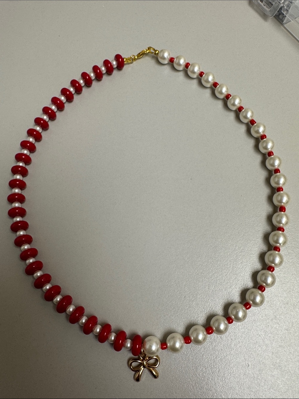 Pearl and Red Beaded Necklace with Bow Charm